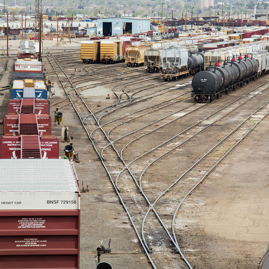 Freight Trains At A Rail Yard Photograph by Jim West