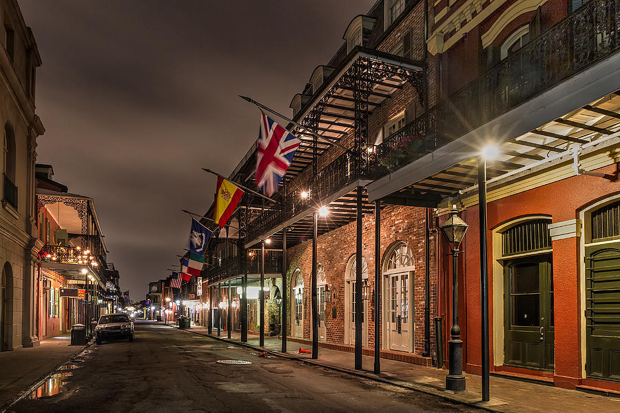 French Quarter Flags Photograph by Tim Stanley
