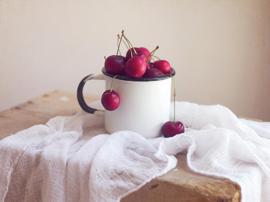Fresh Cherries In Enamel Cup Photograph by Copyright Anna Nemoy(xaomena)