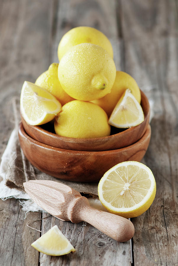 Fresh Lemons Photograph by Oxana Denezhkina