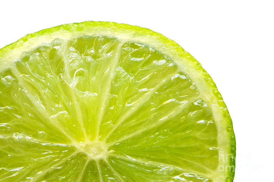 Summer Photograph - Fresh lime isolated on white background by Michal Bednarek