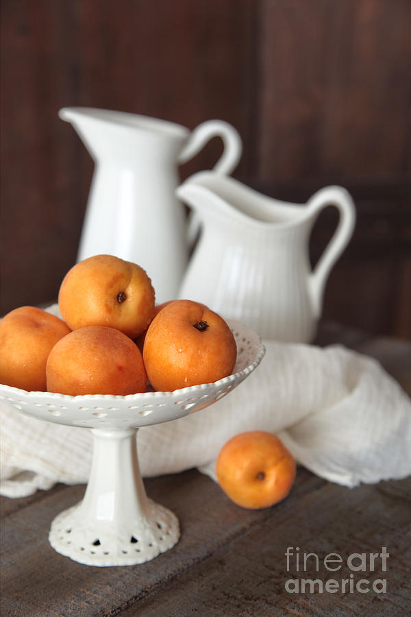 Fresh peaches in bowl on old brown table Photograph by Sandra Cunningham