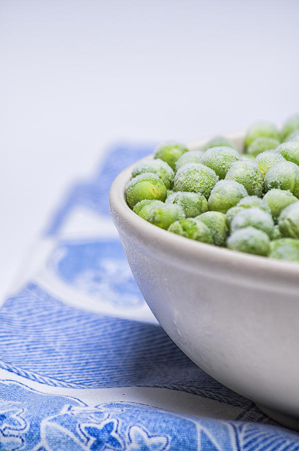 Fresh peas Photograph by Paulo Goncalves
