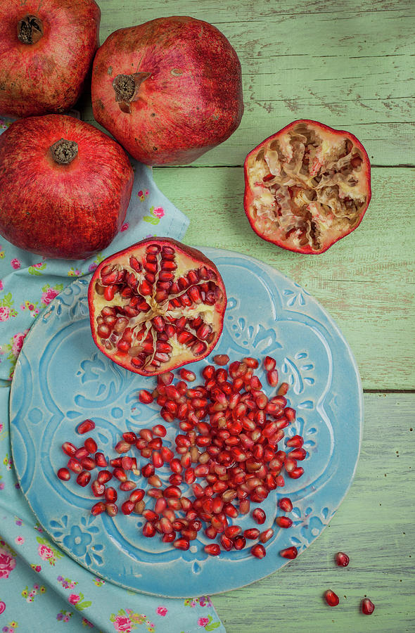 Fresh Pomegranate On A Plate Photograph by © Emoke Szabo