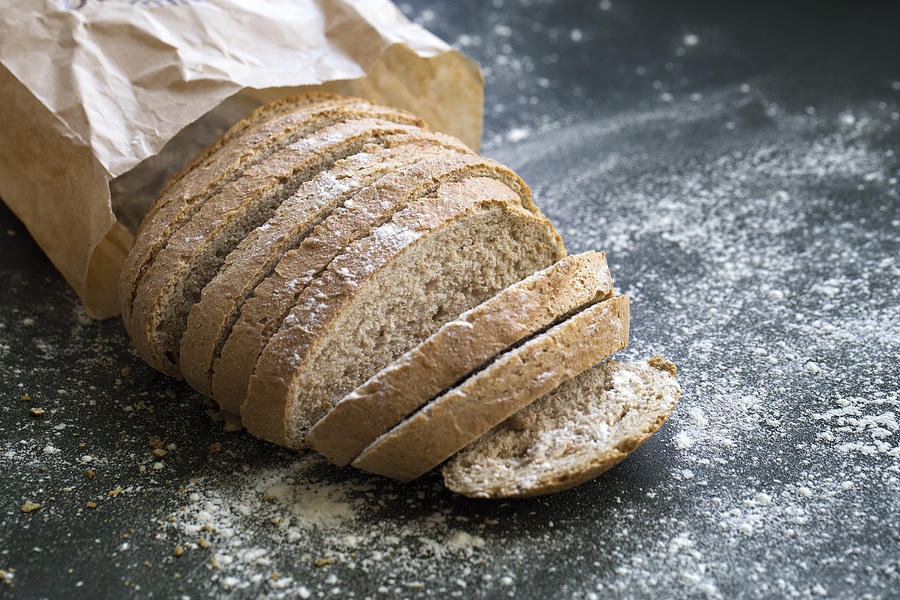 Fresh Sliced whole grain loaf of bread Photograph by Stefka Pavlova