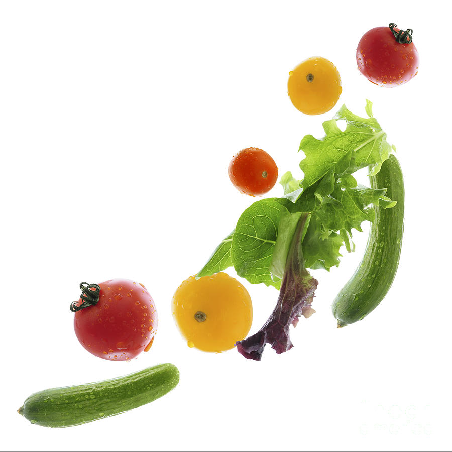 Fresh vegetables flying Photograph by Elena Elisseeva