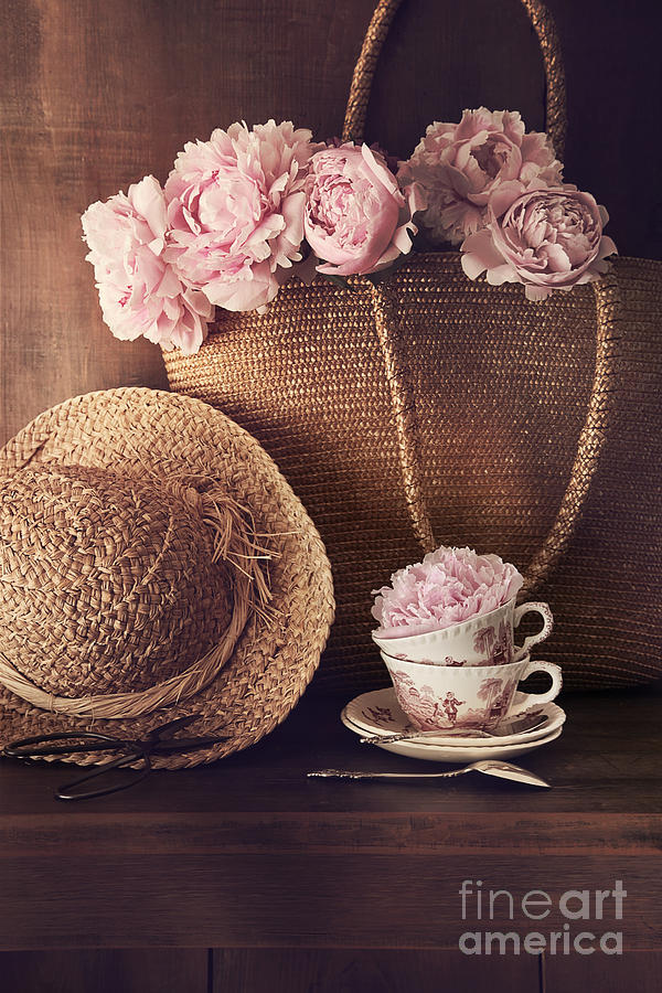 Freshly cut peonies with wicker hat and bag Photograph by Sandra Cunningham