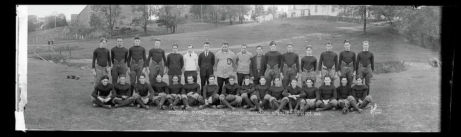 Black And White Photograph - Freshman Football Squad, Catholic by Fred Schutz Collection