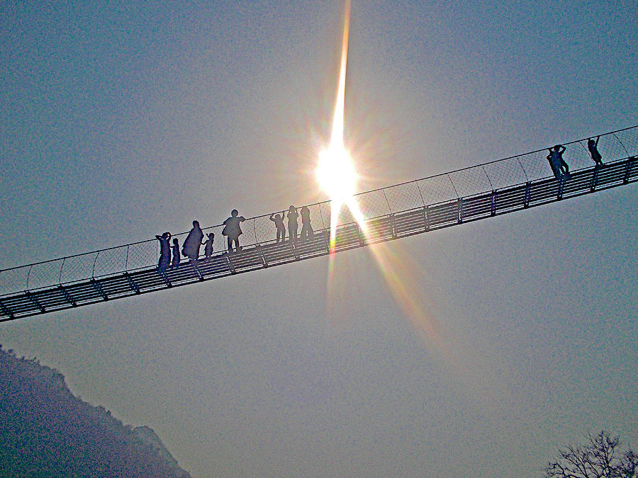 friendly-nepali-in-the-sunlight-on-the-suspension-bridge-over-the-seti