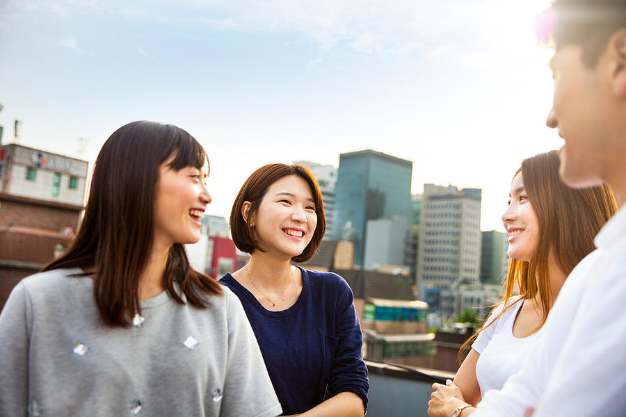 Friends meeting and party on Seoul rooftop, South Korea Photograph by Leonardo Patrizi
