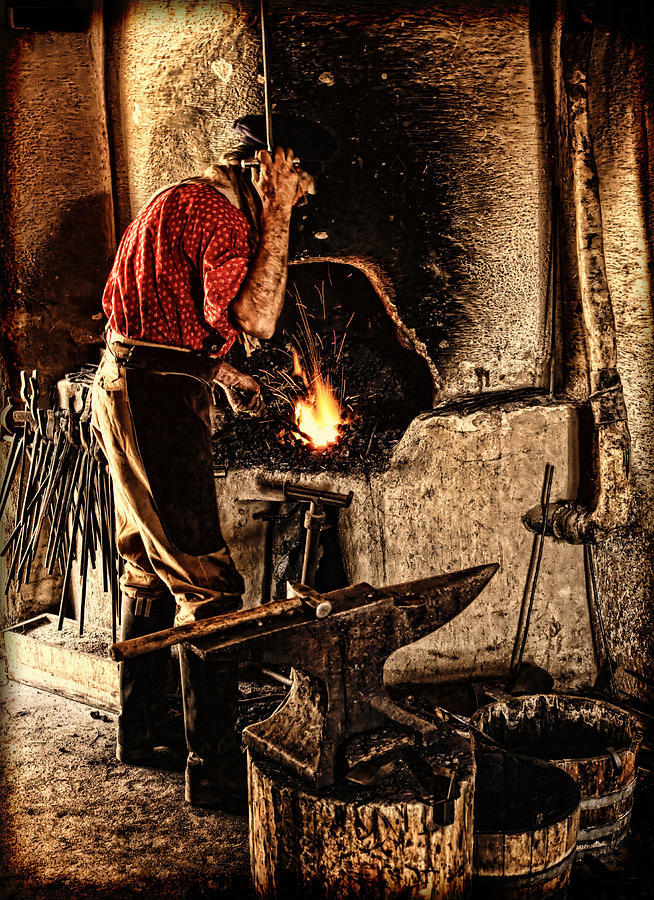 Frontier Blacksmith at the Forge Photograph by Lincoln Rogers
