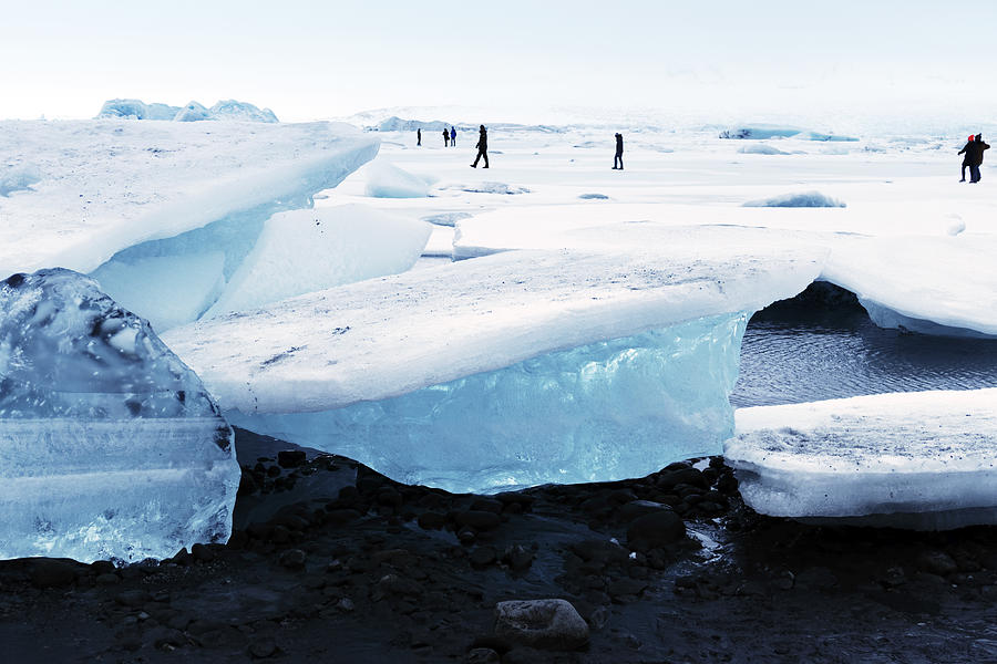 Frozen Jokulsarlon glacial lagoon in winter, Iceland Photograph by Veronica Bogaerts