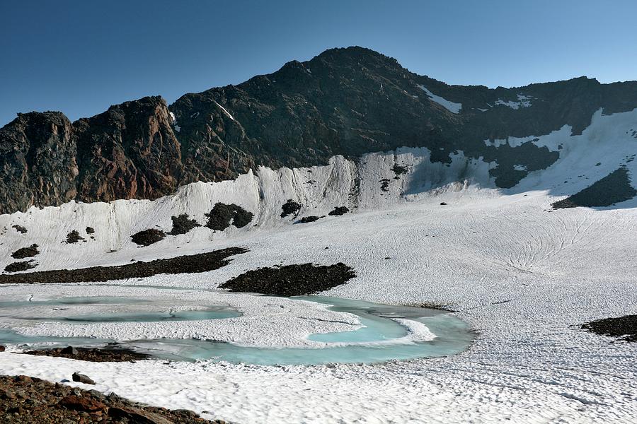 Frozen Mountain Lake Photograph by Martin Rietze