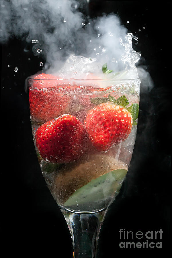Fruit cocktail explosion Photograph by Simon Bratt