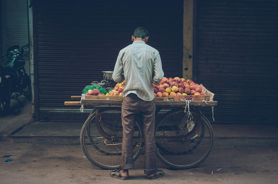 Fruit seller Photograph by Runner Of Art