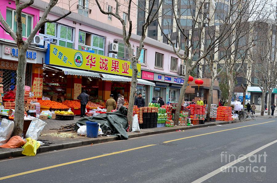 Fruit shop and street scene Shanghai China Photograph by Imran Ahmed