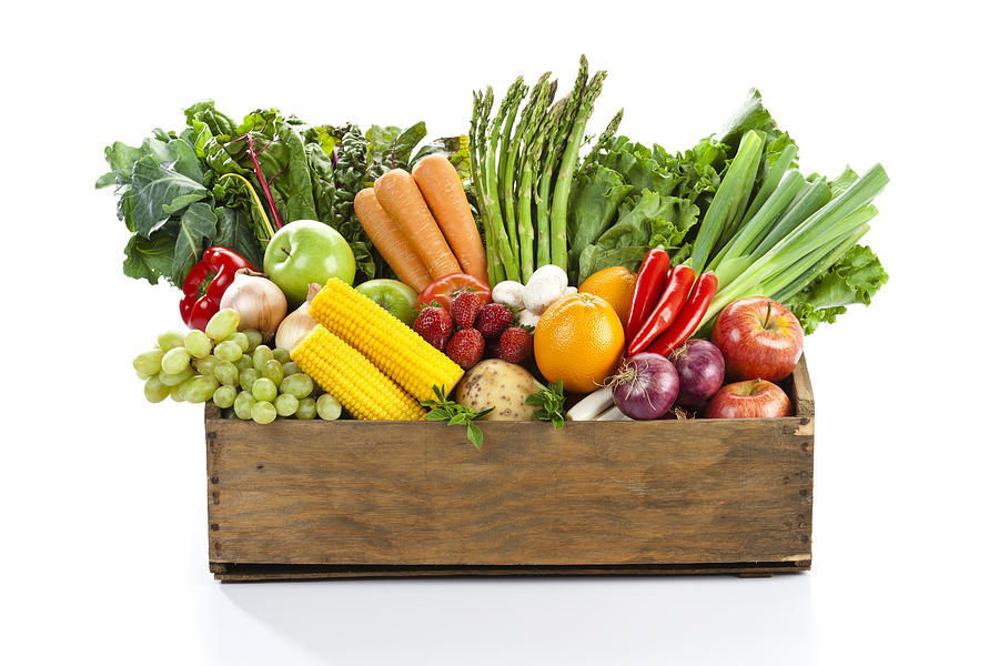 Fruits and veggies in wood box with white backdrop Photograph by Fcafotodigital