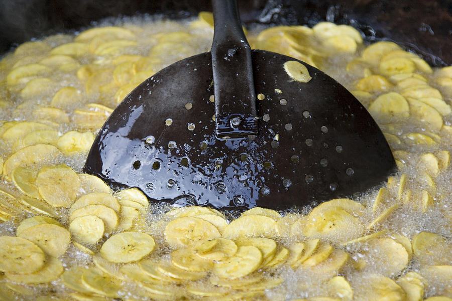 Frying Banana Chips Photograph by Sonny Marcyan