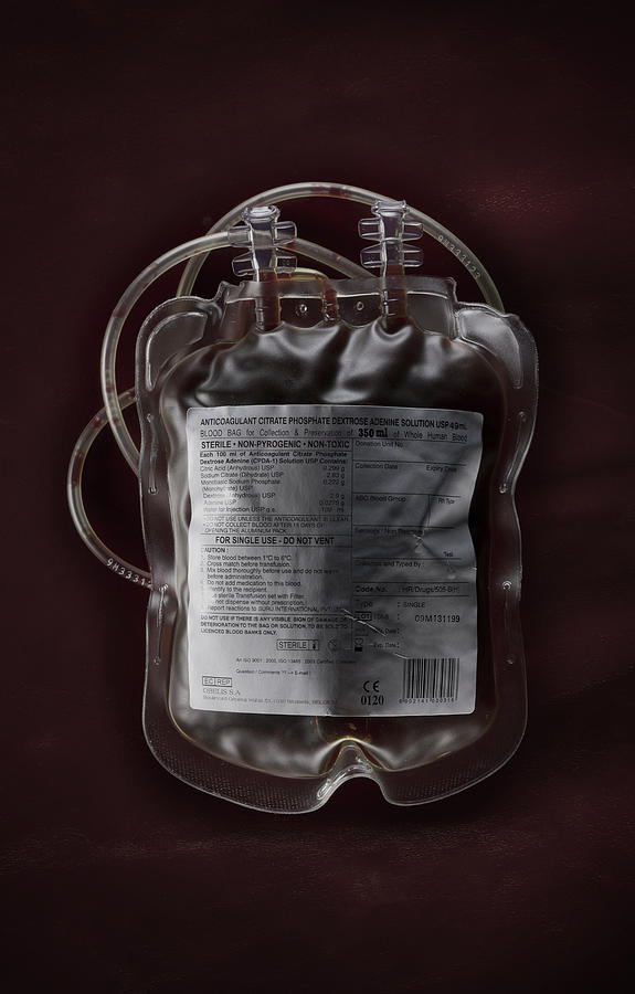 Full Blood Bag On Blood Red Background Photograph by Justin Lambert