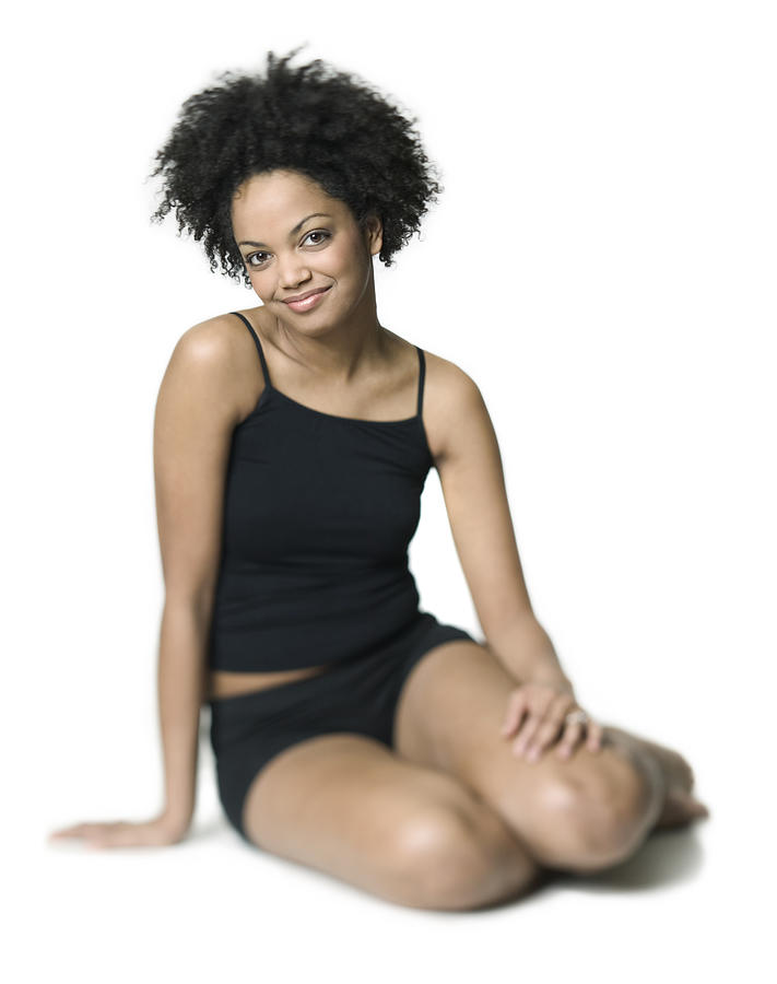 Full Body Shot Of A Young African American Woman In A Black Workout Outfit As She Smiles Photograph by Photodisc