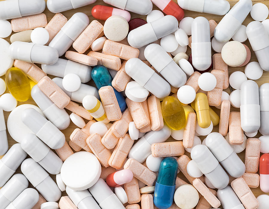 Full frame heap of various colors pills and capsules, close-up Photograph by Jose A. Bernat Bacete