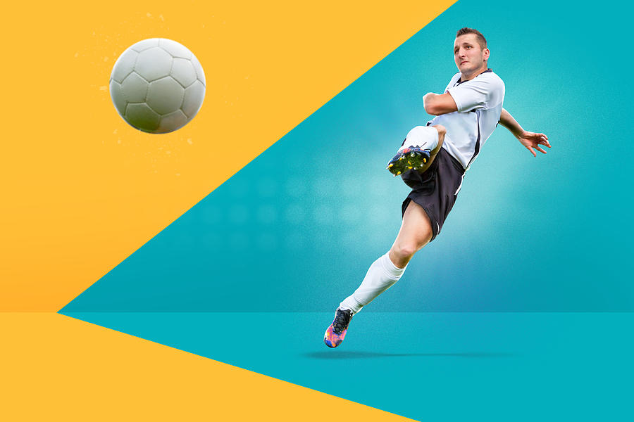 Full Length Of Man Playing Soccer Against Colored Background Photograph by Val Thoermer / EyeEm Full Length Of Man Playing Soccer Against Colored Background Photograph by Val Thoermer / EyeEm