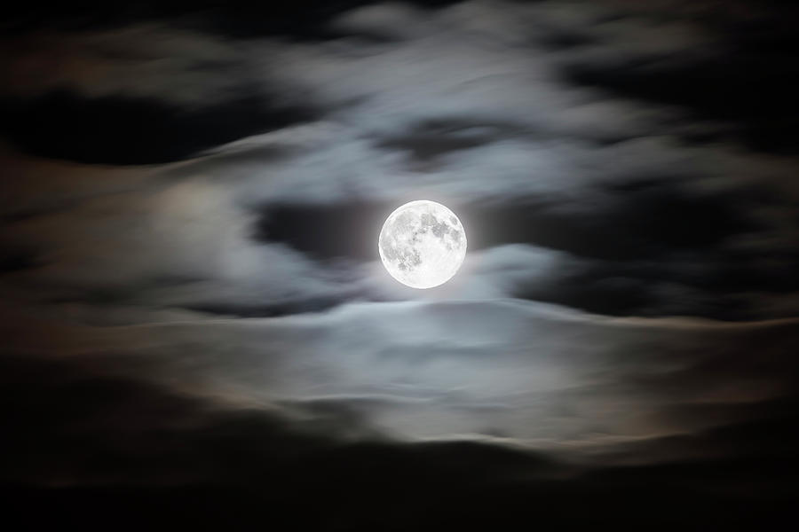 Full Moon On A Cloudy Night Sky Photograph by Bjorn Holland