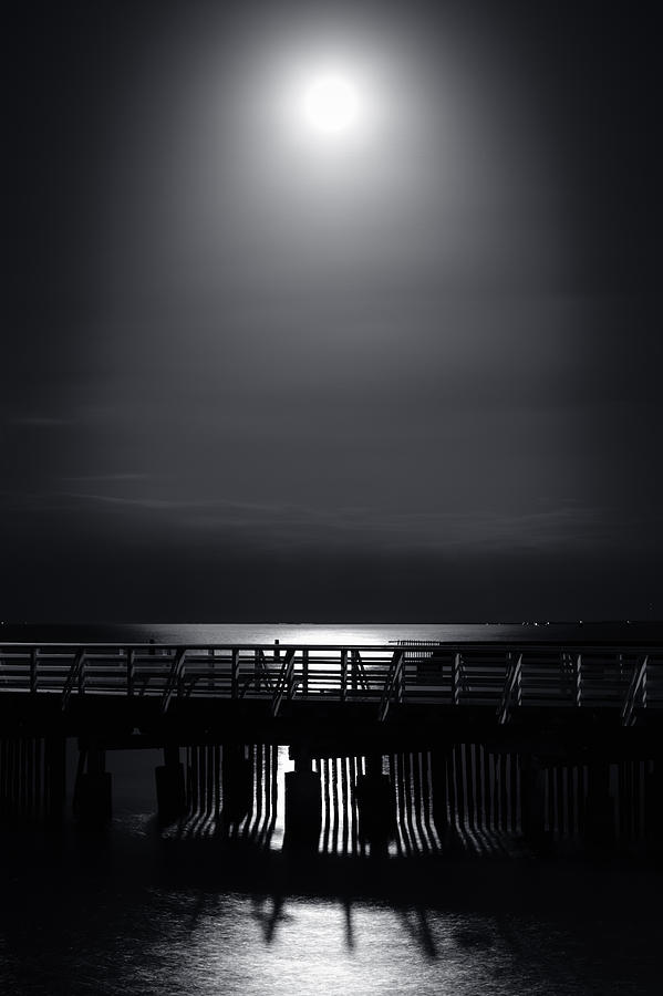 Black And White Photograph - Full Moon over Bramble Bay by Silken Photography