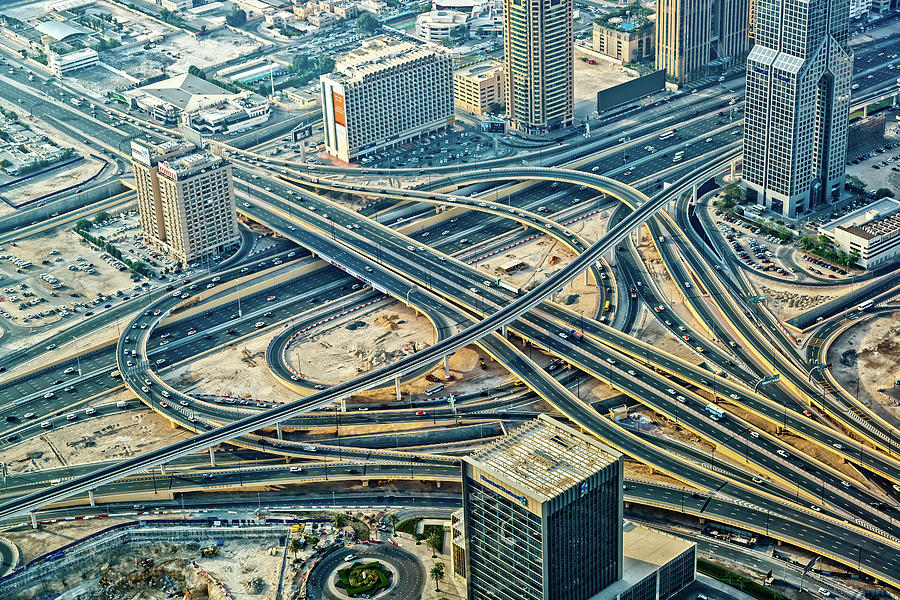Futuristic Traffic Junction In Dubai Photograph by Mbbirdy