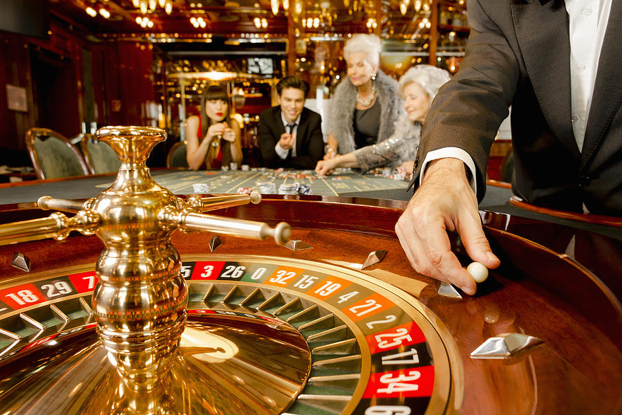 Game of luck in a casino Photograph by Matthias Tunger