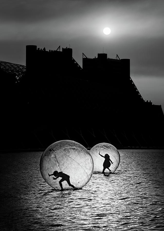 Transportation Photograph - Games In A Bubble by Juan Luis Duran
