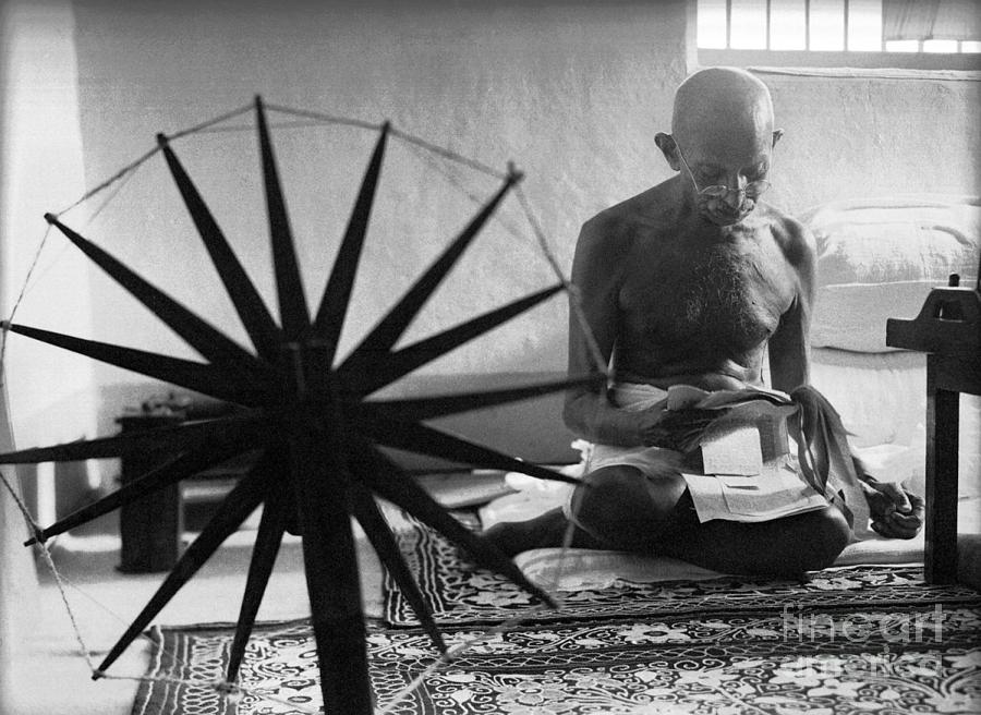 Gandhi At His Spinning Wheel Photograph