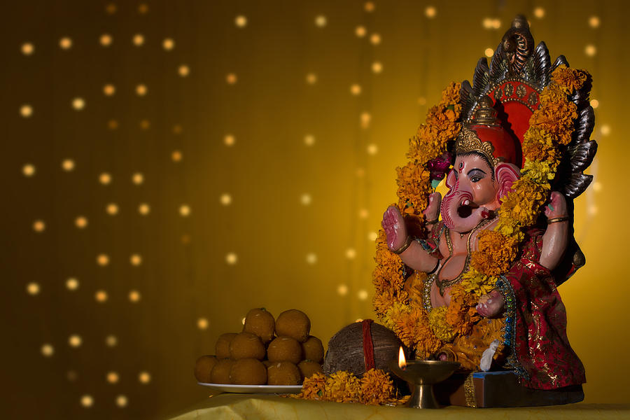 Ganesh idol and laddus Photograph by Madhurima Sil