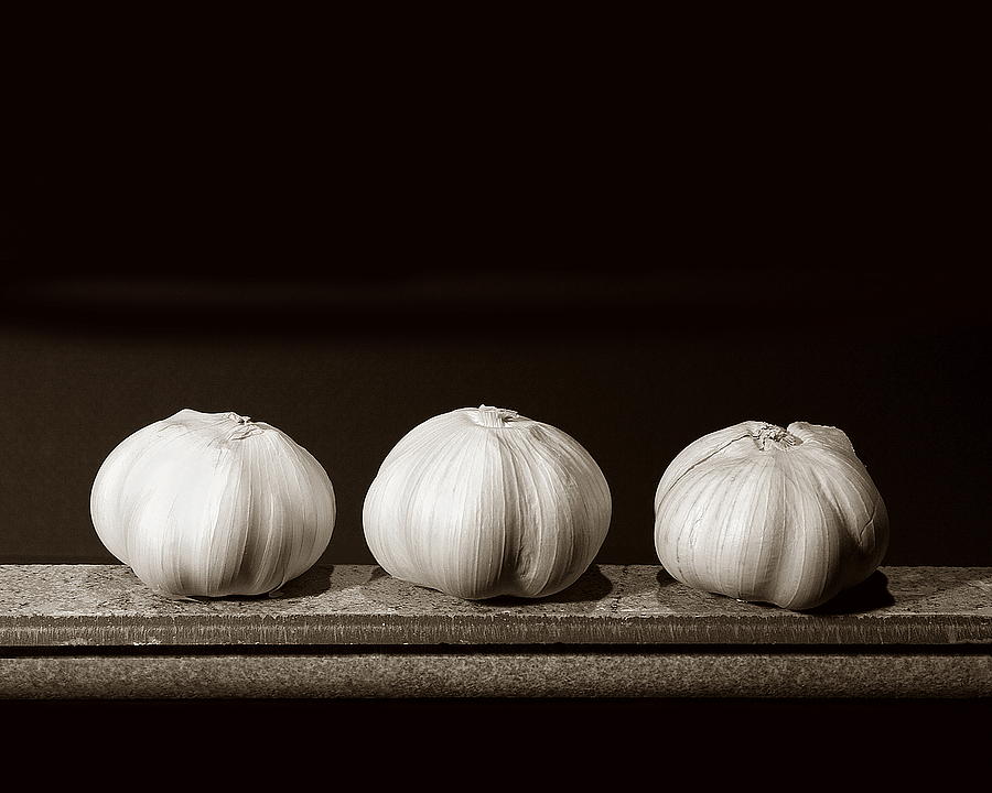 Garlics on Marble Shelf Photograph by Viktor Savchenko