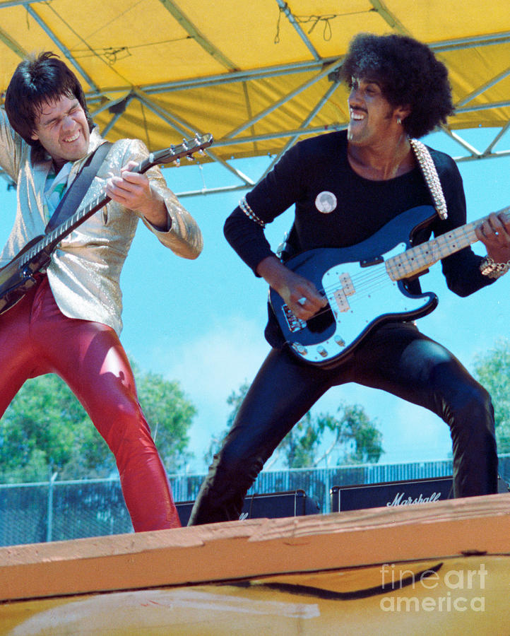 Gary Moore and Phil Lynott of Thin Lizzy at Day on the Green, Oakland CA 7-4-79 Photograph by Daniel Larsen