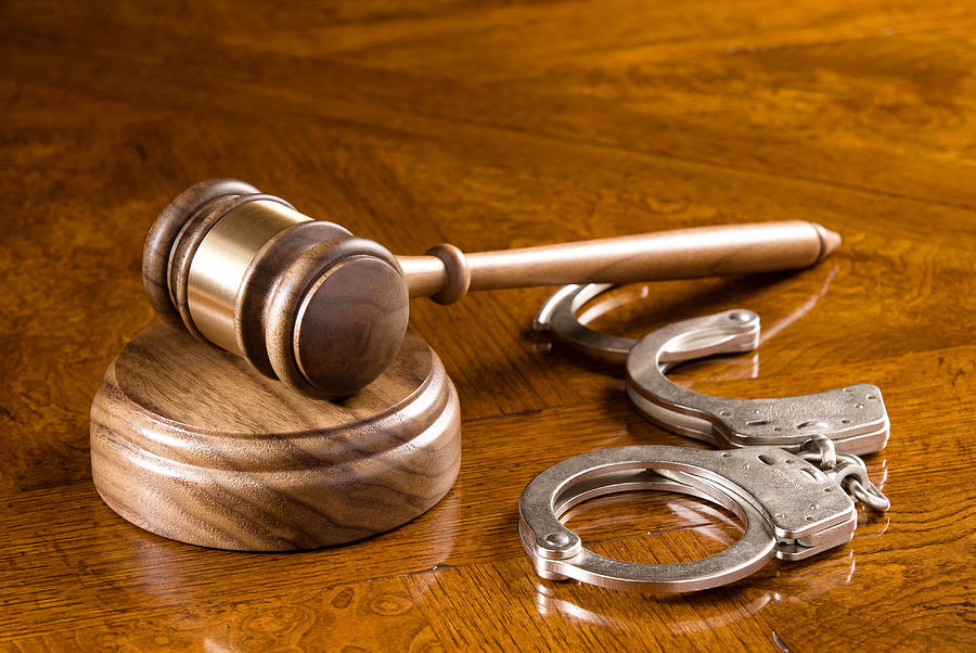 Gavel and handcuffs Photograph by Joe Belanger - Pixels