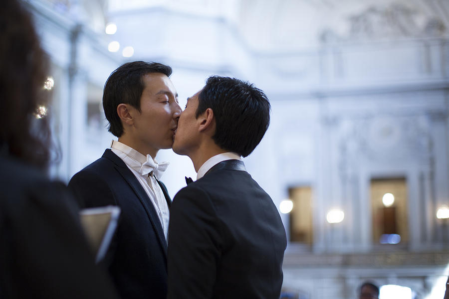 Gay couple getting married in San Francisco. Photograph by Photography by Braden Summers