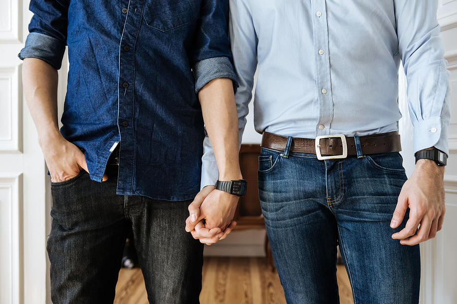 Gay Couple Holding Hands Photograph by Hinterhaus Productions