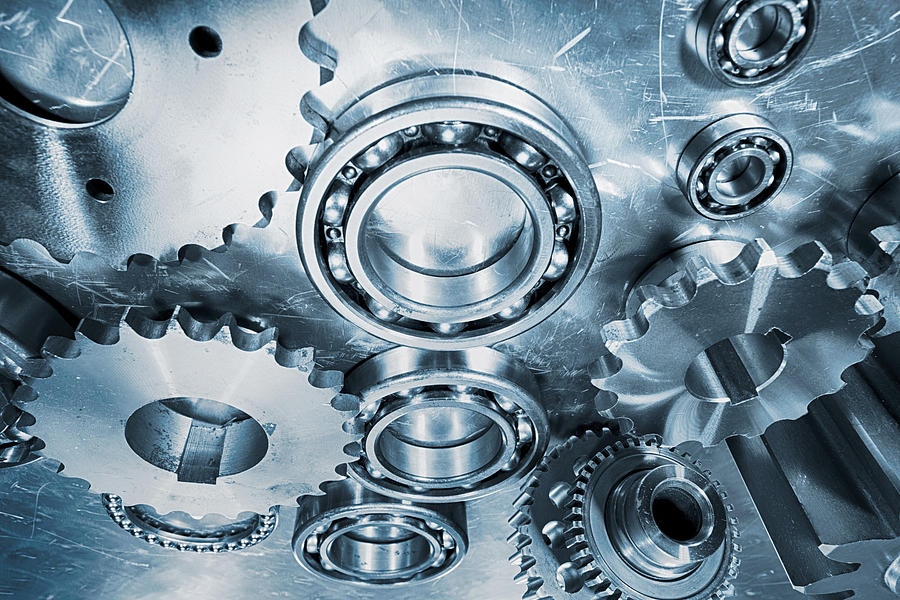 Gears And Cogs Of Special Titanium Photograph by Christian Lagereek