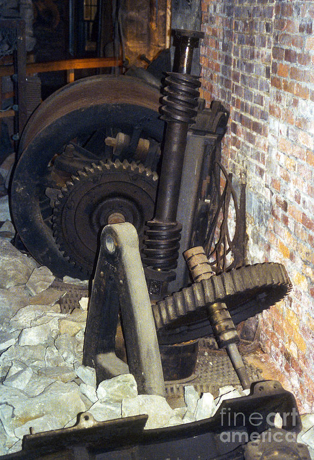 Gears and Rubble Photograph by Bob Phillips