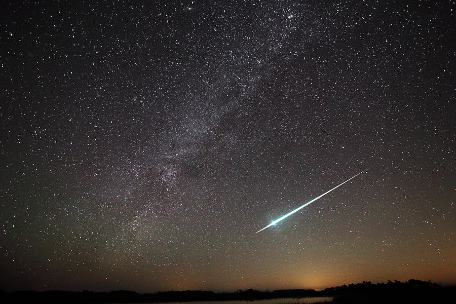 Gemini Photograph - Geminid Meteor in Florida by Jean Clark