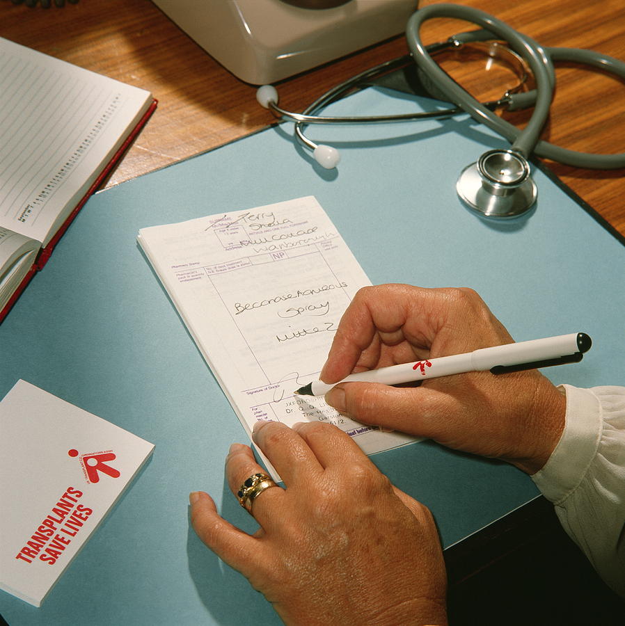 General Practitioner Writing A Prescription Photograph by Sheila Terry/science Photo Library