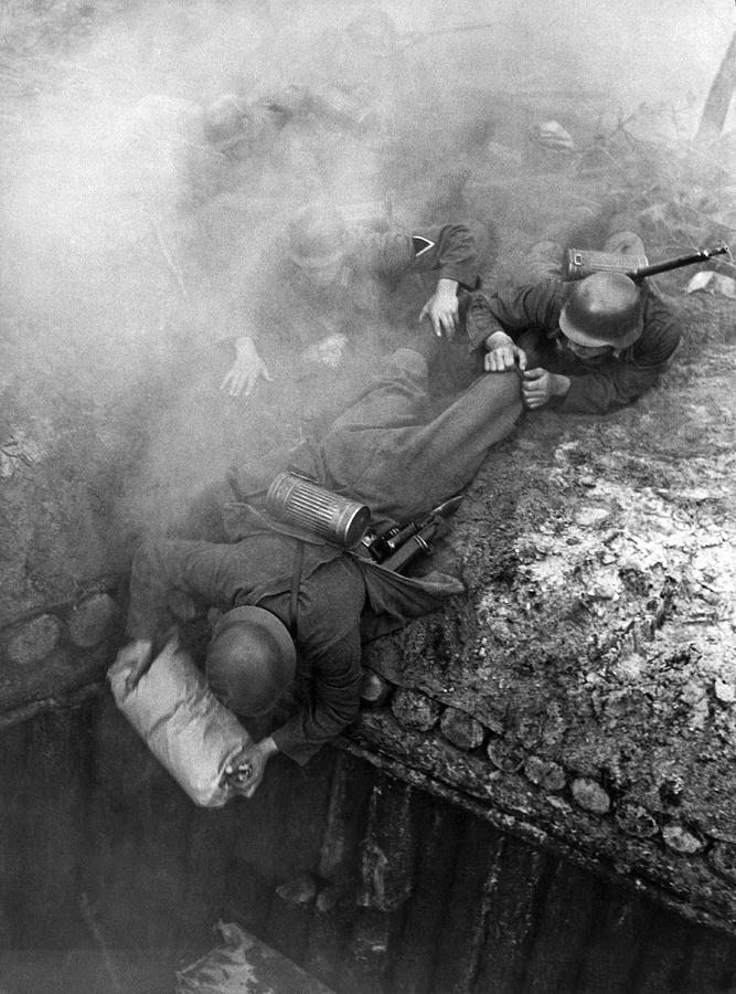 Black And White Photograph - German soldiers launch a suprise attack on Bunker 17. by Underwood Archives