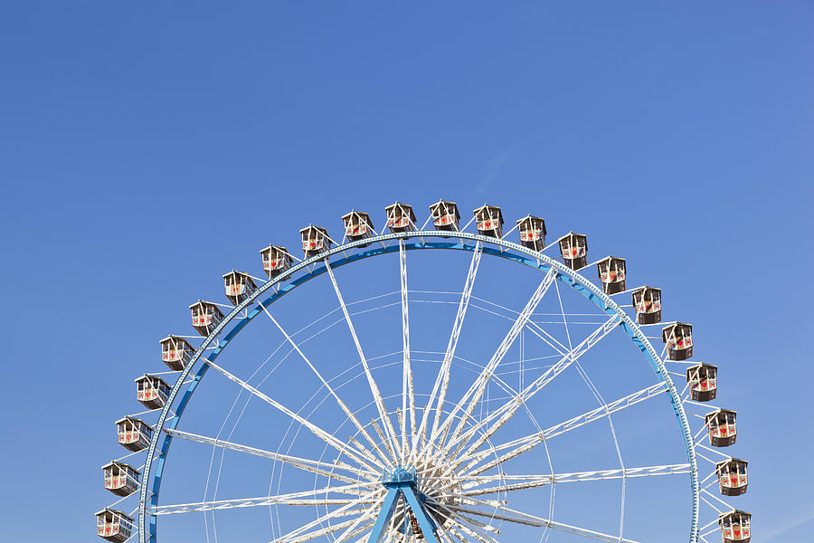 Germany, Bavaria, Munich, View of part of ferris wheel against clear sky Photograph by Westend61