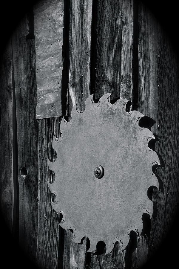 Black And White Photograph - Ghost Town vintage Saw Blade by Lisza Anne McKee