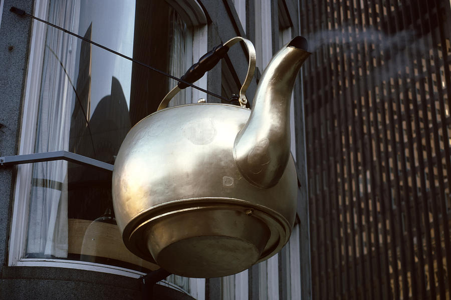Architecture Photograph - Giant Kettle Hanging From Building by Panoramic Images