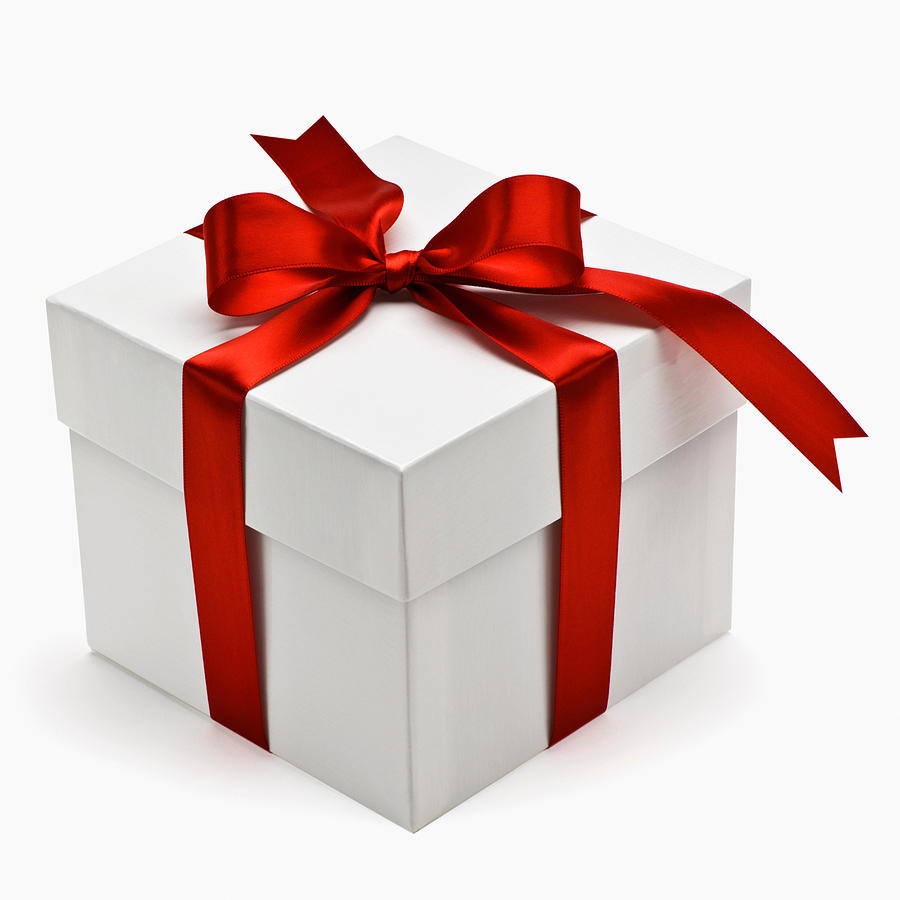 Gift box with red ribbon Photograph by Image Source