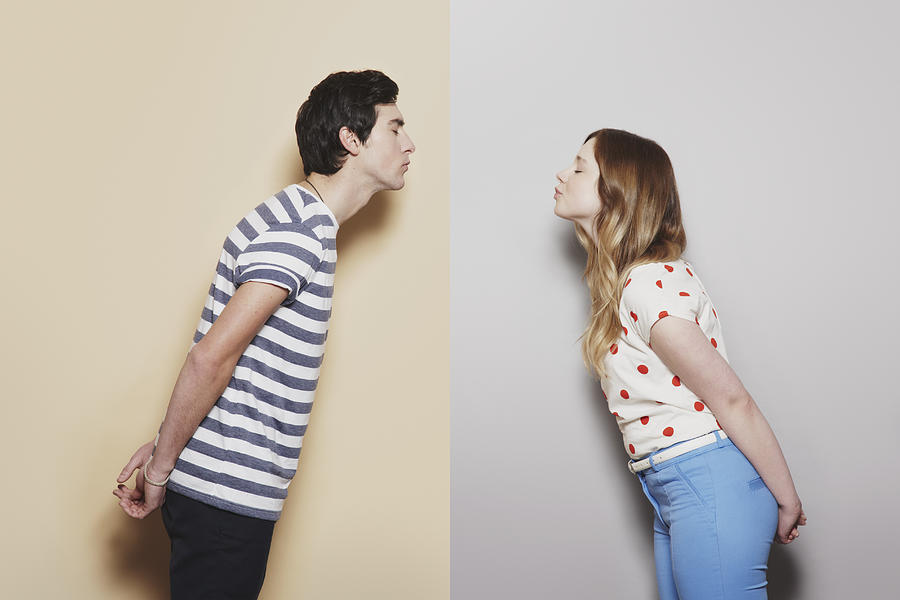 Girl and boy about to kiss Photograph by David Ryle Girl and boy about to kiss Photograph by David Ryle