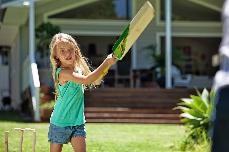 Girl Batting At Cricket Photograph by Marilyn Nieves