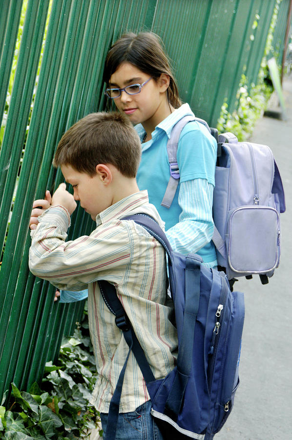 Girl Comforting An Unhappy Boy Photograph by Aj Photo/science Photo Library